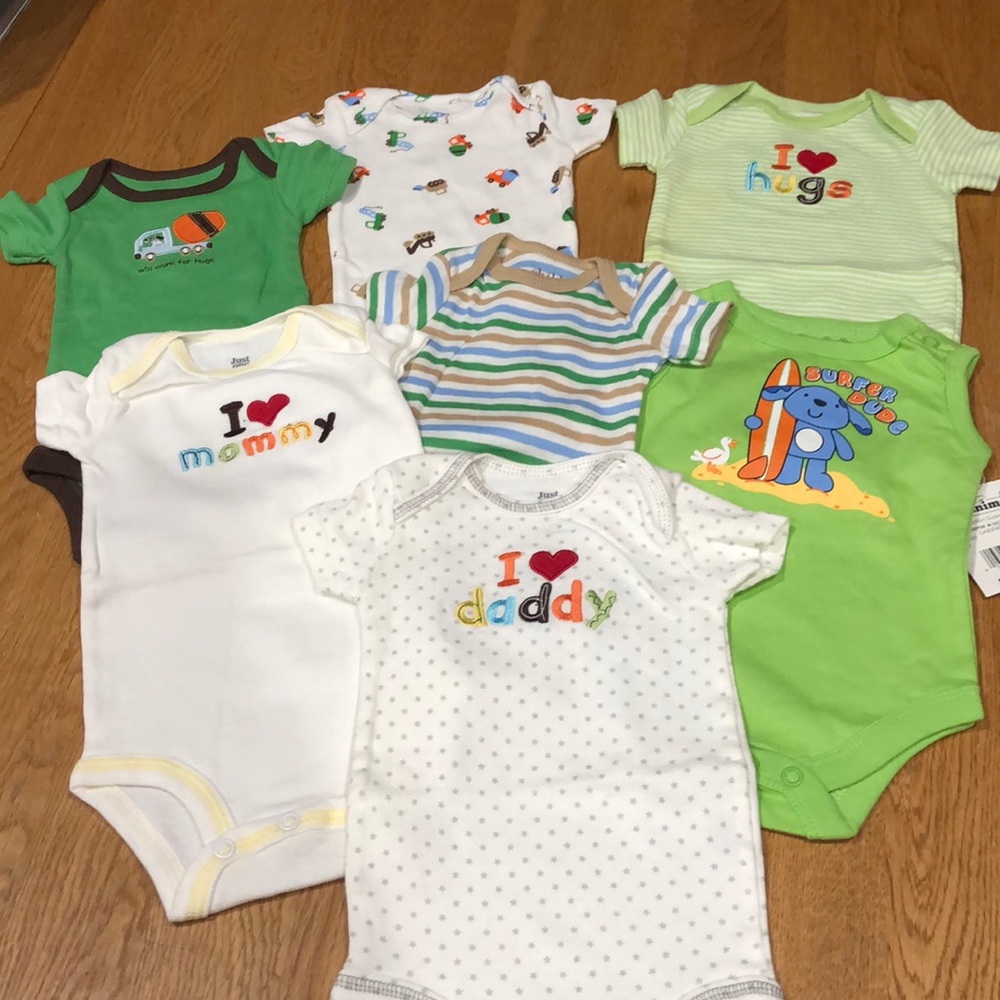 6/carters 1/garanimals onesie never worn.newborn